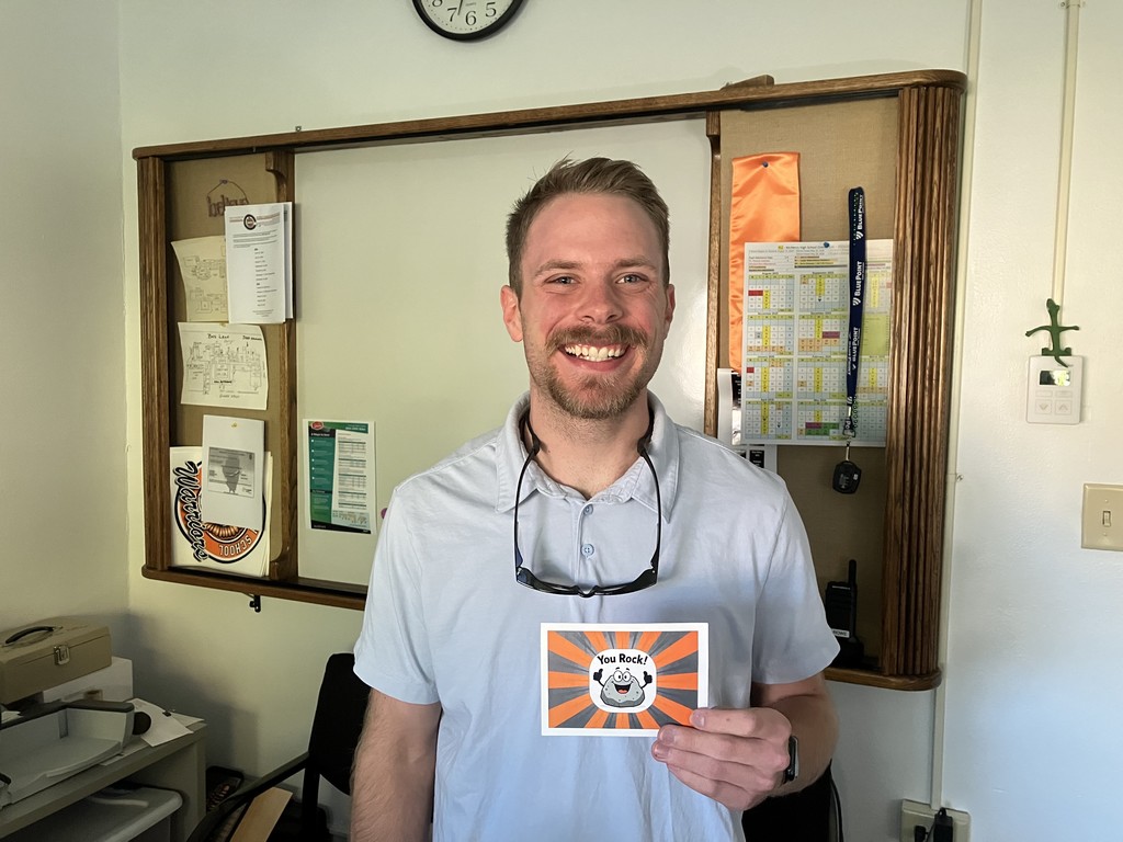 Payton holding "You Rock" card