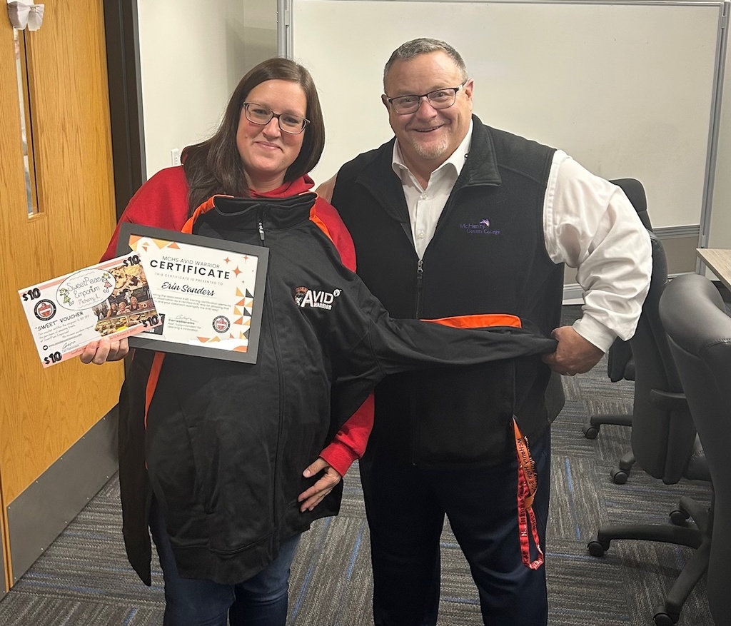 Erin Sanders and Carl Vallinaots. Erin Sanders with certificate and jacket