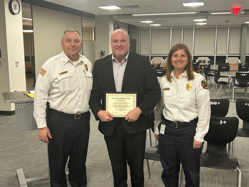 McHenry Township Fire Protection District Chief Horist and Deputy Chief Bush visited the District 156 board meeting Monday to present a certificate of appreciation to Dr. McTague in honor of the longstanding partnership between the school district and the fire district.