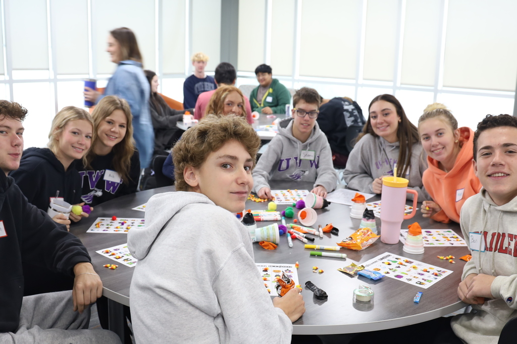 Students at a table with activities 