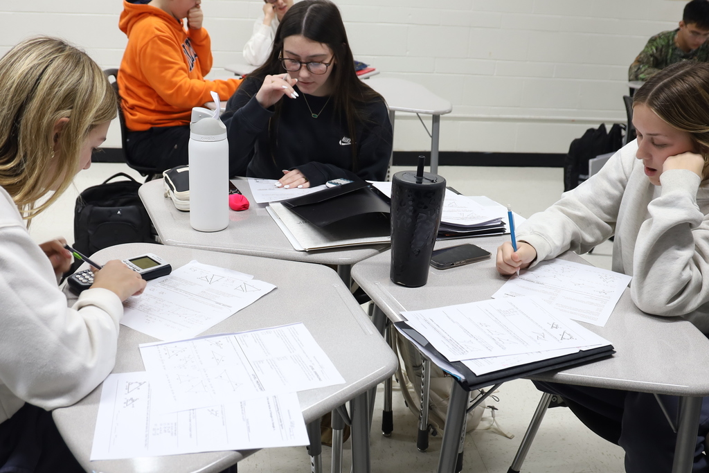 Students working on geometry problems