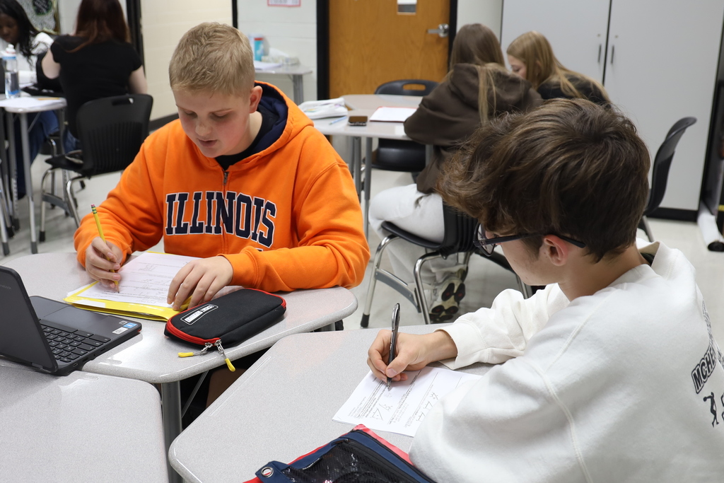 Students working on geometry problems