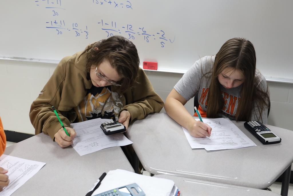 Students working on geometry problems