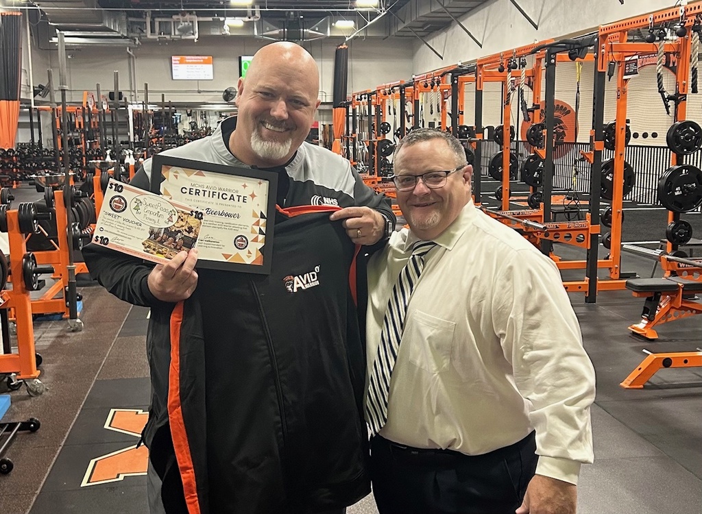 John Beerbower with certicate and jacket and Carl Vallianatos