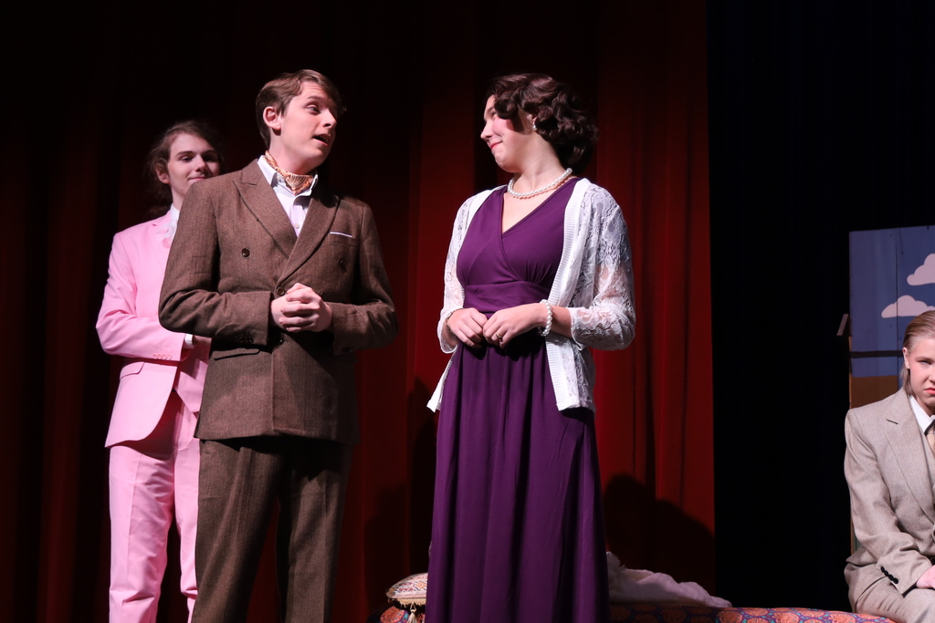 Woman smiling at man