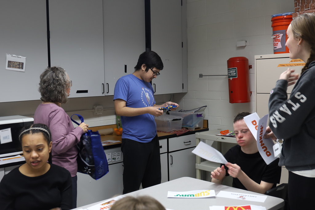 Student looking at socks