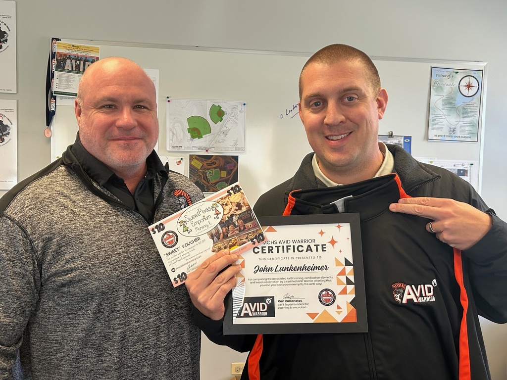 Dr. McTague and John Lunkenheimer with his AVID Warrior Certificate and jacket
