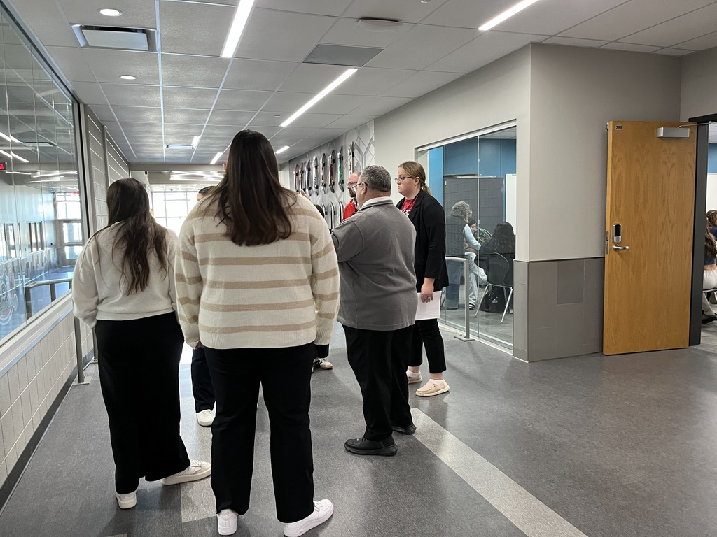 Students looking at the building