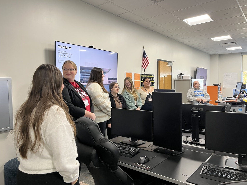 Students looking at the computer lab