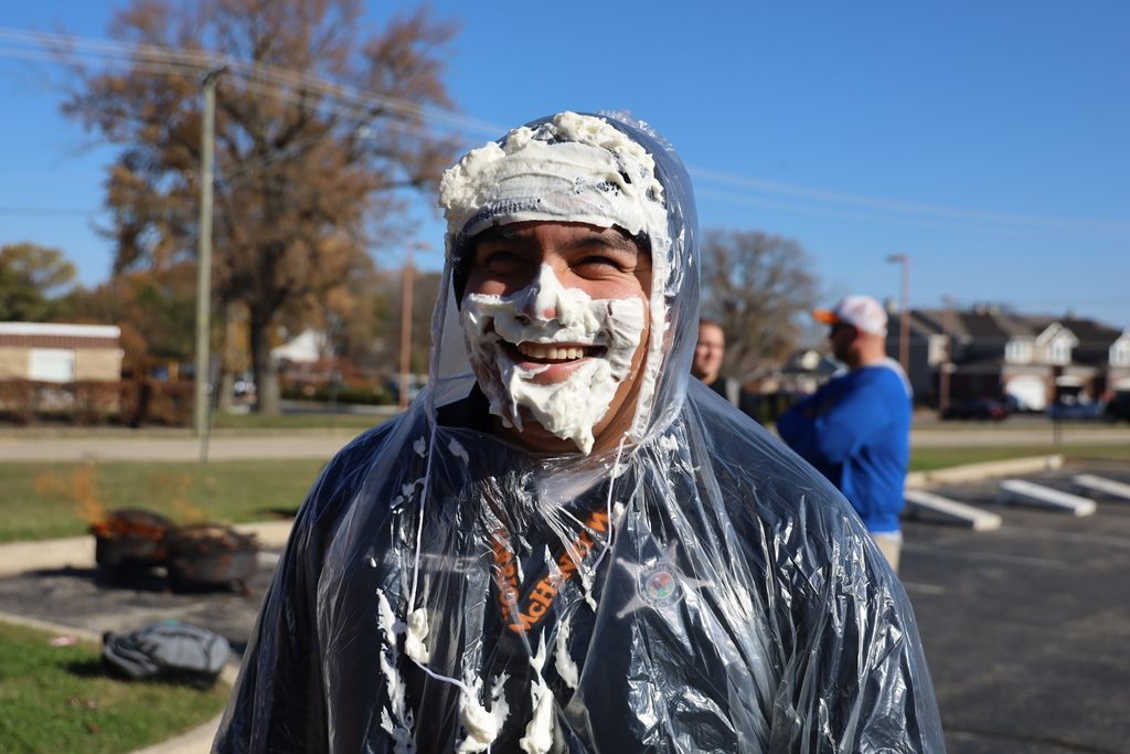 Officer Martinez covered in whipped cream 