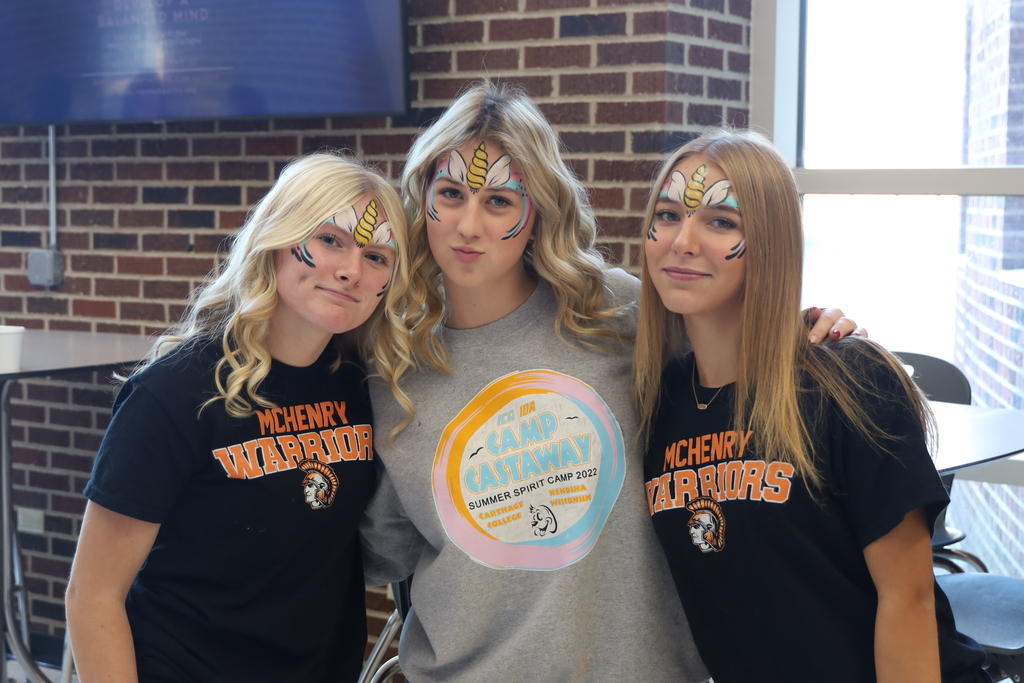 Students with unicorn face paint