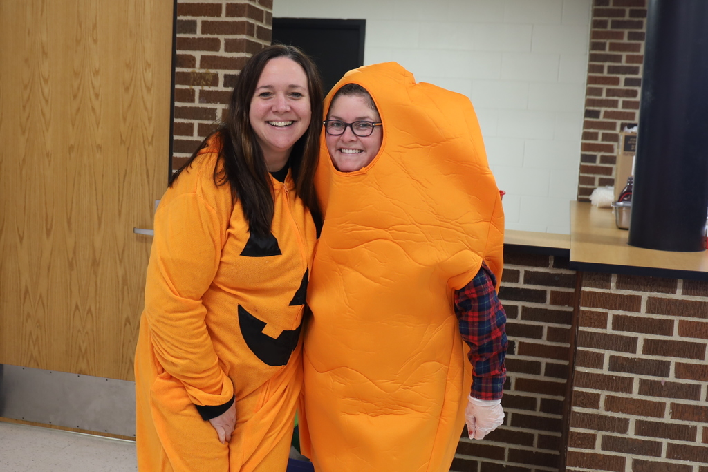 Teacher dressed as pumpkin teacher dressed as carrot