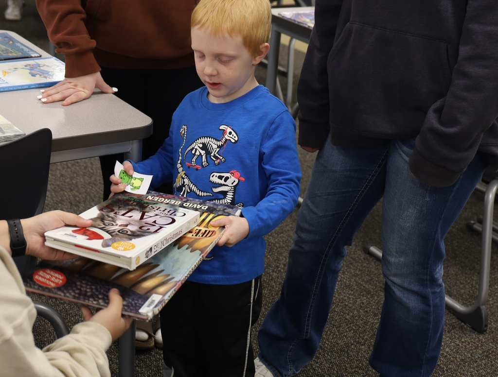 Preschooler with books 