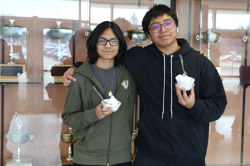 Two students holding ice cream