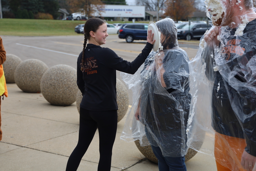 Student pieing teacher in face