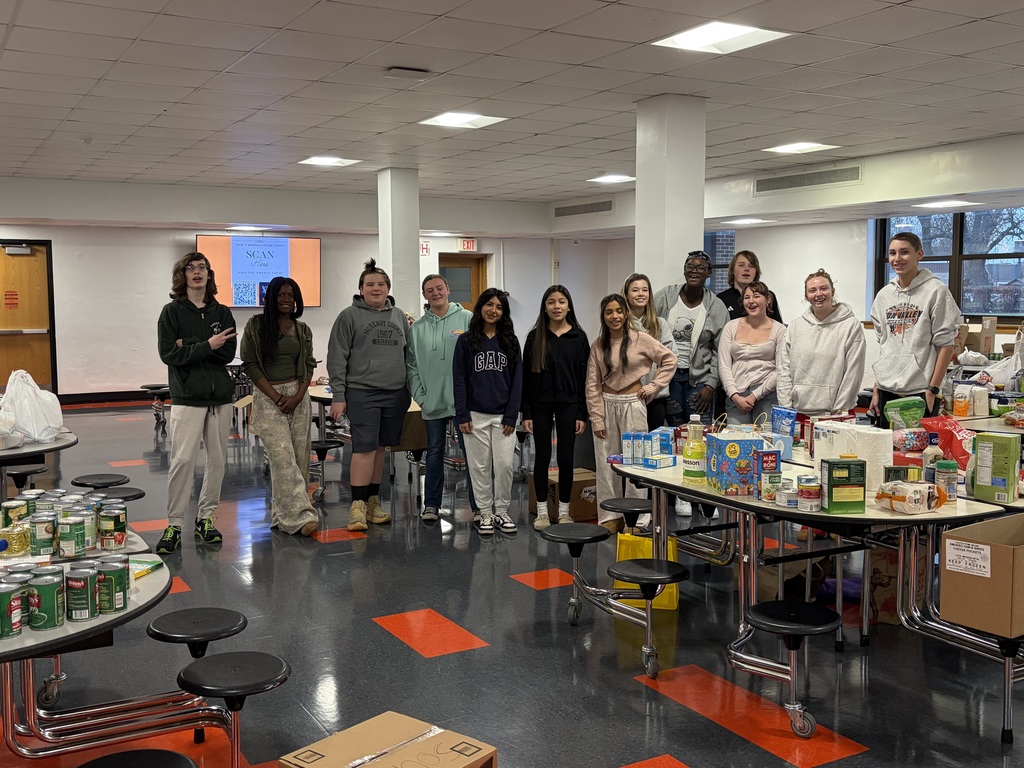 Group of students with food donations