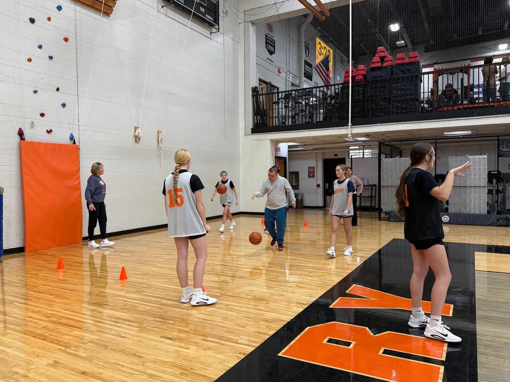 Freshman Girls Basketball team helps Special Olympics basektball athletes prepare for an upcoming game and skills competition