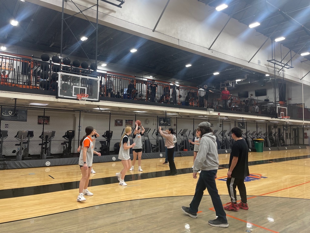 Freshman Girls Basketball team helps Special Olympics basektball athletes prepare for an upcoming game and skills competition