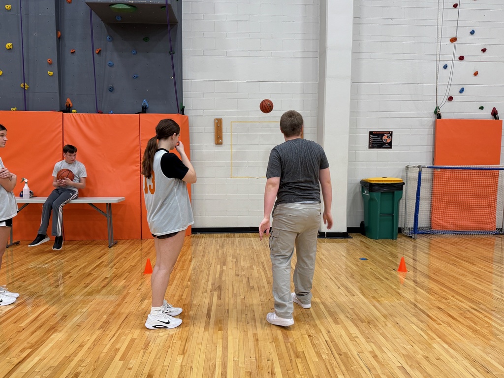 Freshman Girls Basketball team helps Special Olympics basektball athletes prepare for an upcoming game and skills competition