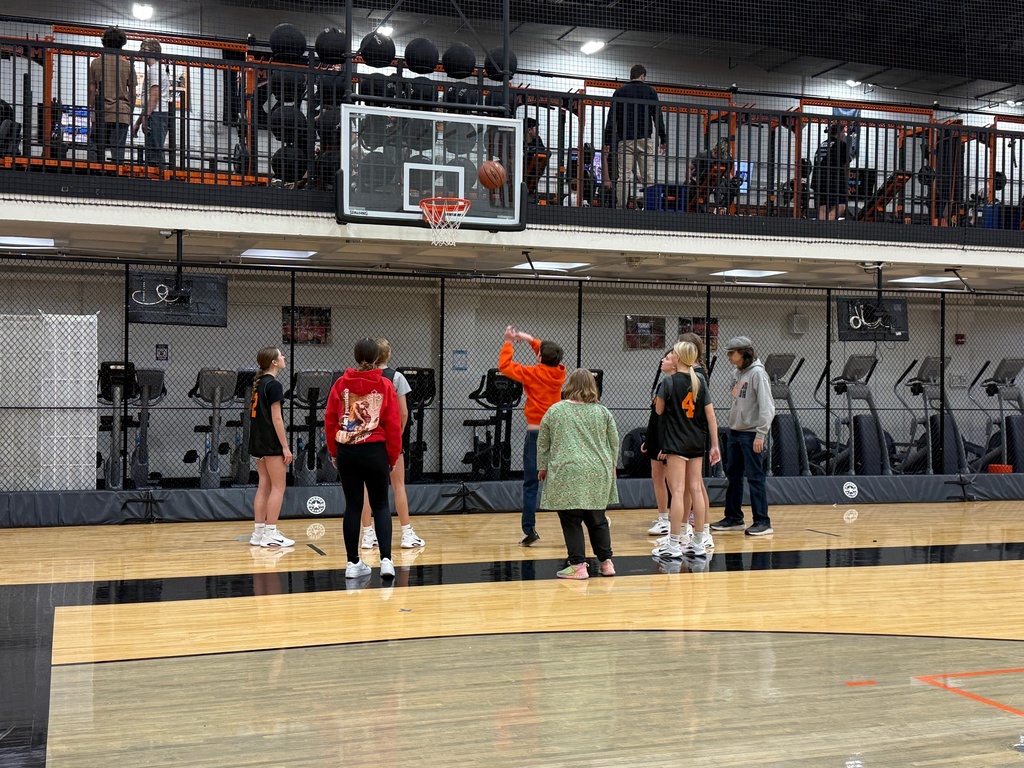 Freshman Girls Basketball team helps Special Olympics basektball athletes prepare for an upcoming game and skills competition