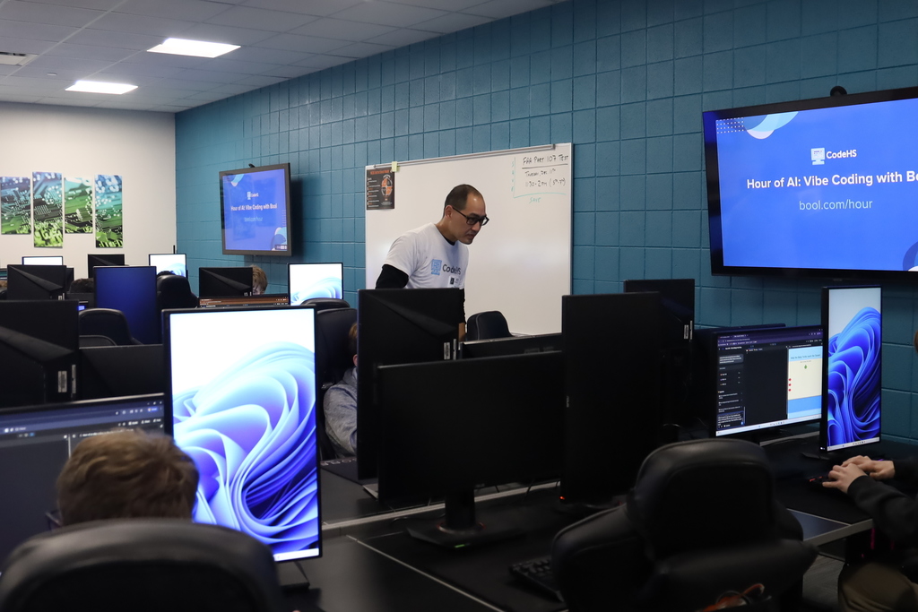 Rep from Code HS helping students in the computer lab