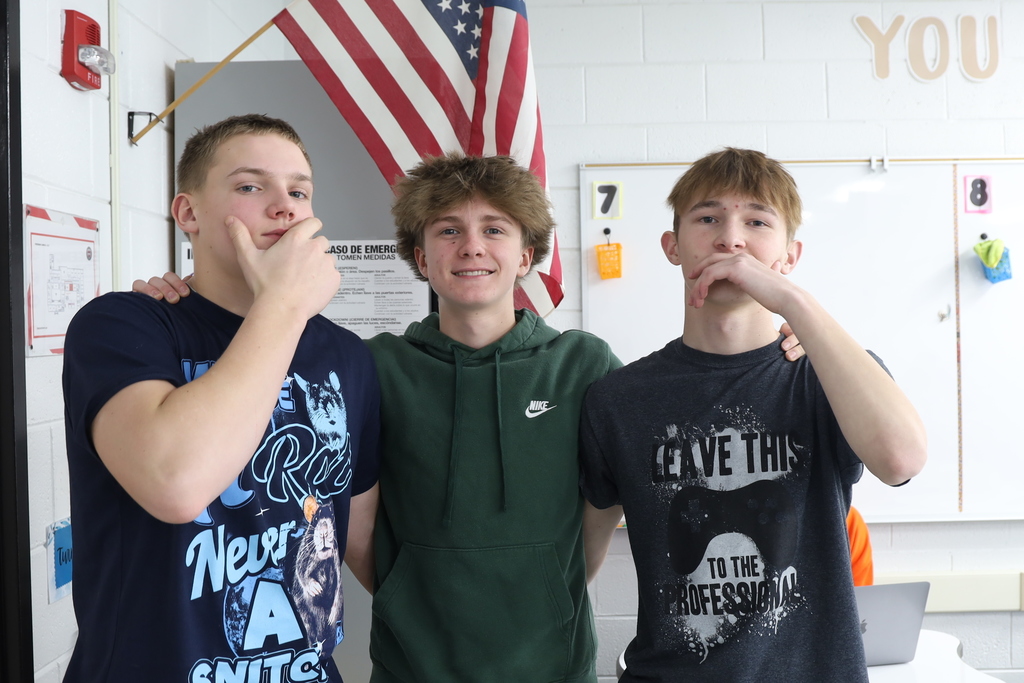 Three students posing 
