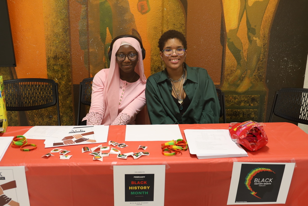 Two students at a Black History Month booth
