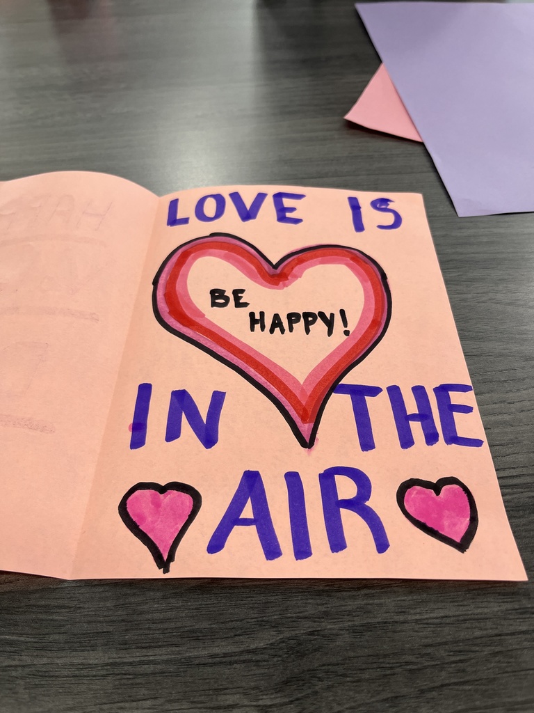 Card that says Love is in the air be happy!