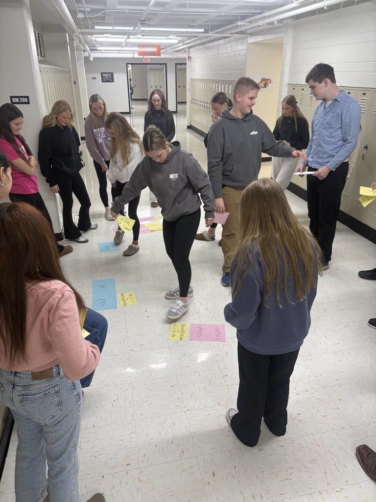 Ms. Bennett's Spanish 1 students worked on an activity together to practice verb phrases