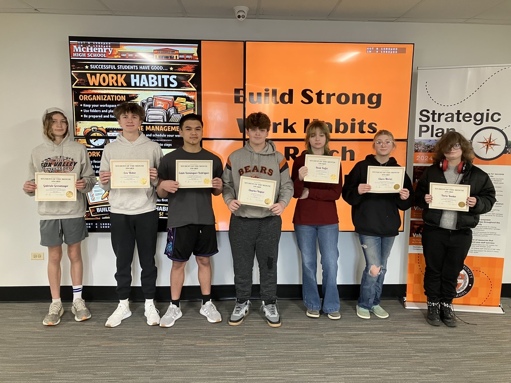 Group photo of students holding their certificates