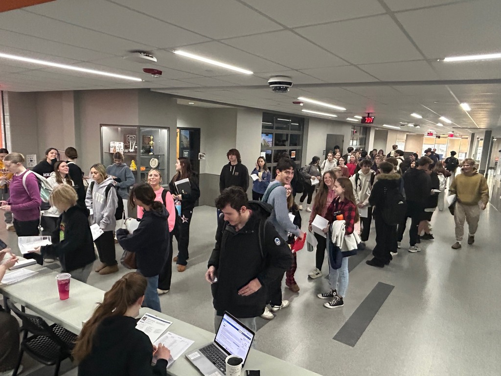 Students waiting in line to check in 