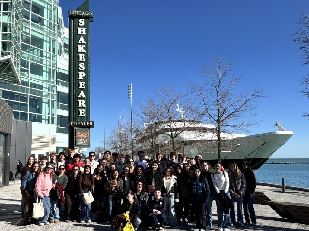An English class and teacher by Shakespeare Theatre outside by Navy Pier