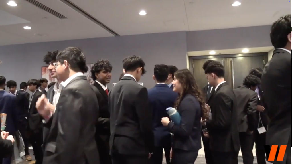 Business Professionals of America students mingling in business atire 