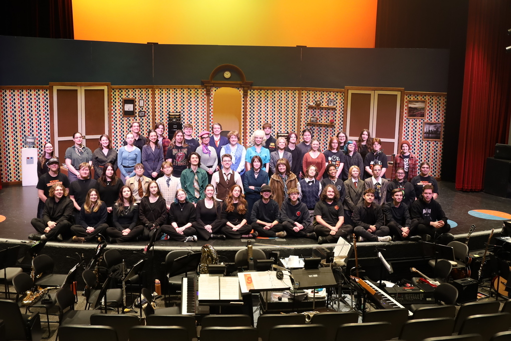 Full cast and crew on stage