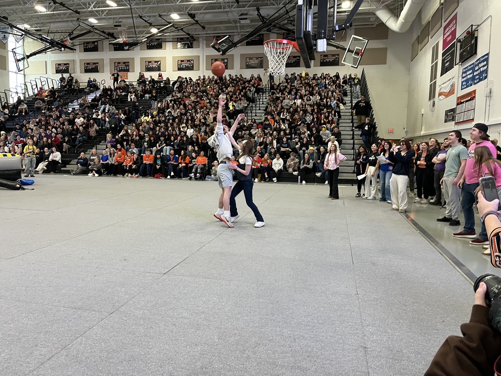 Photo of MCHS students participating in a March Madness pep rally March 13