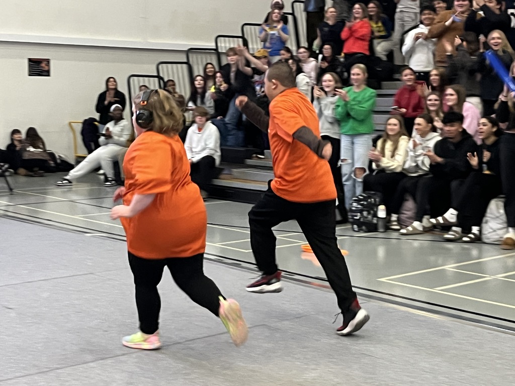 Photo of MCHS students participating in a March Madness pep rally March 13