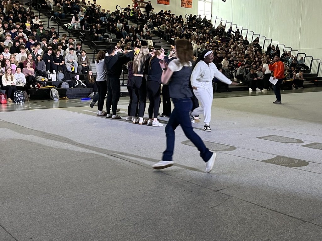 Photo of MCHS students participating in a March Madness pep rally March 13
