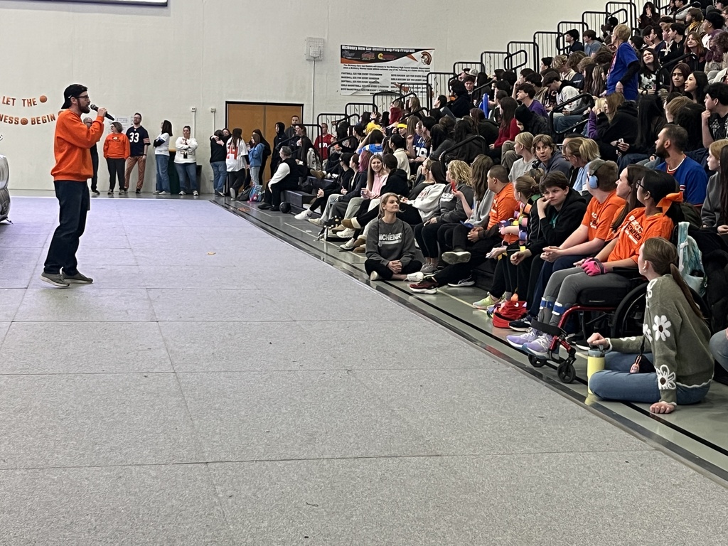 Photo of MCHS students participating in a March Madness pep rally March 13