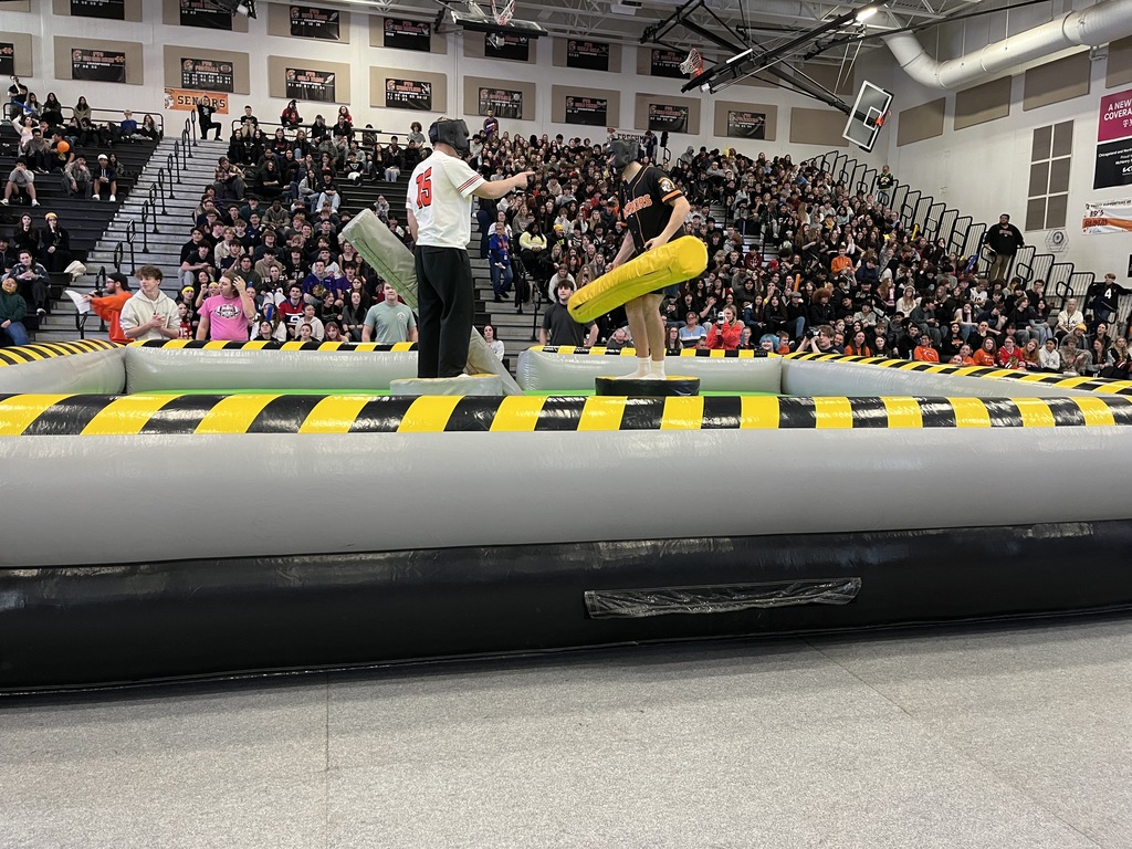 Photo of MCHS students participating in a March Madness pep rally March 13