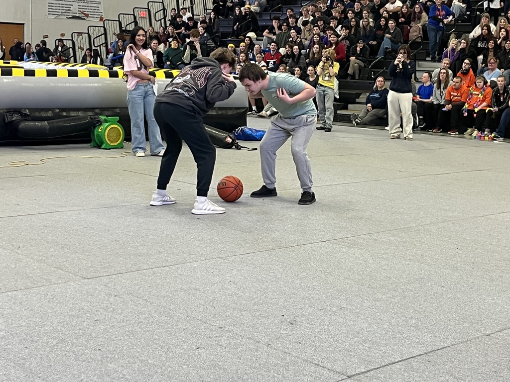 Photo of MCHS students participating in a March Madness pep rally March 13