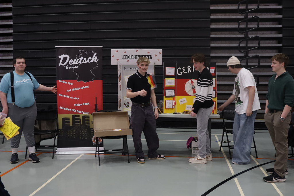 Students in font of Germany signs