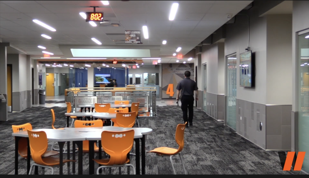 Security walking in the school hallway