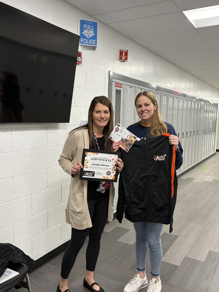 Jennifer Johnson with certificate Megan Edwards standing next to her with Avid jacket