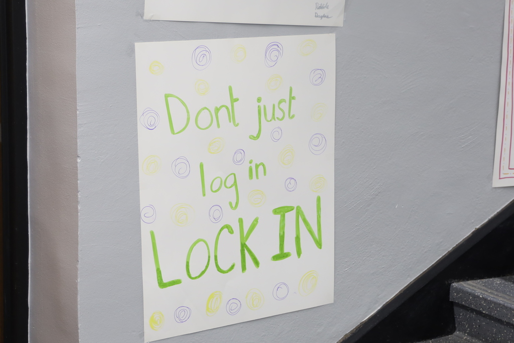 Poster that says don't just log in lock in