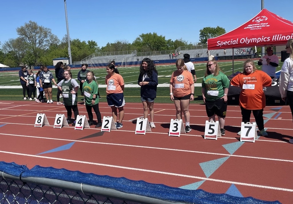 Student on track standing in front of how they placed
