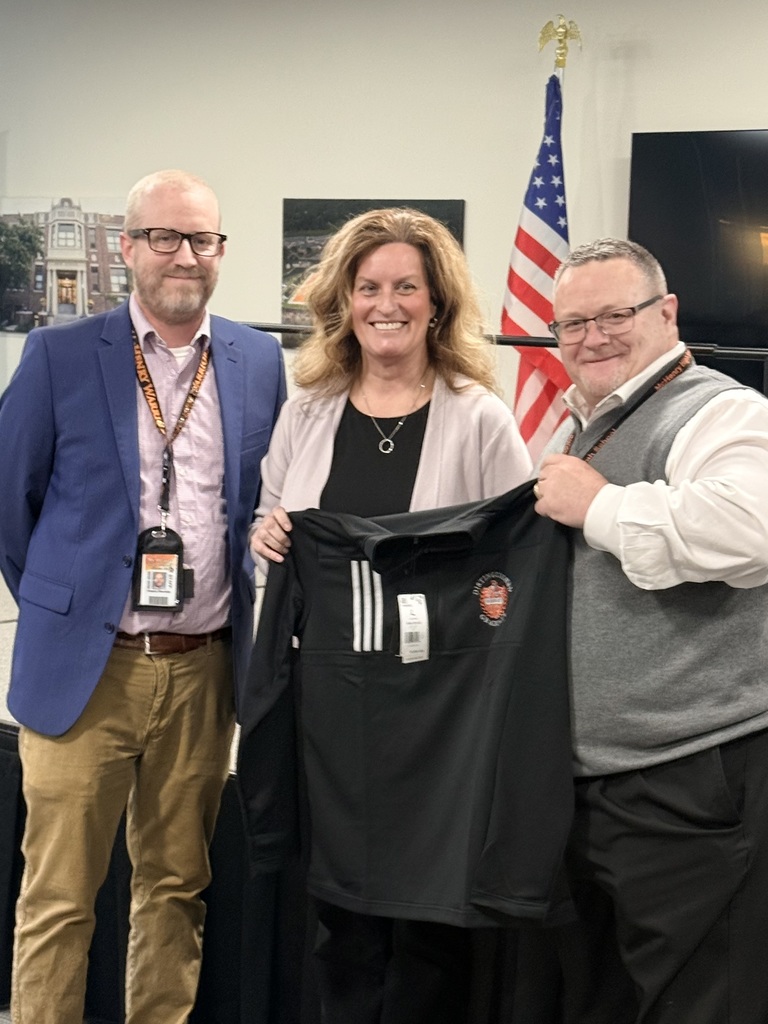 Amy Druml, center, is the 2026 MCHS Distinguished Graduate