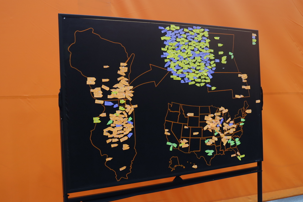 Map with sticky notes in locations where people are going 
