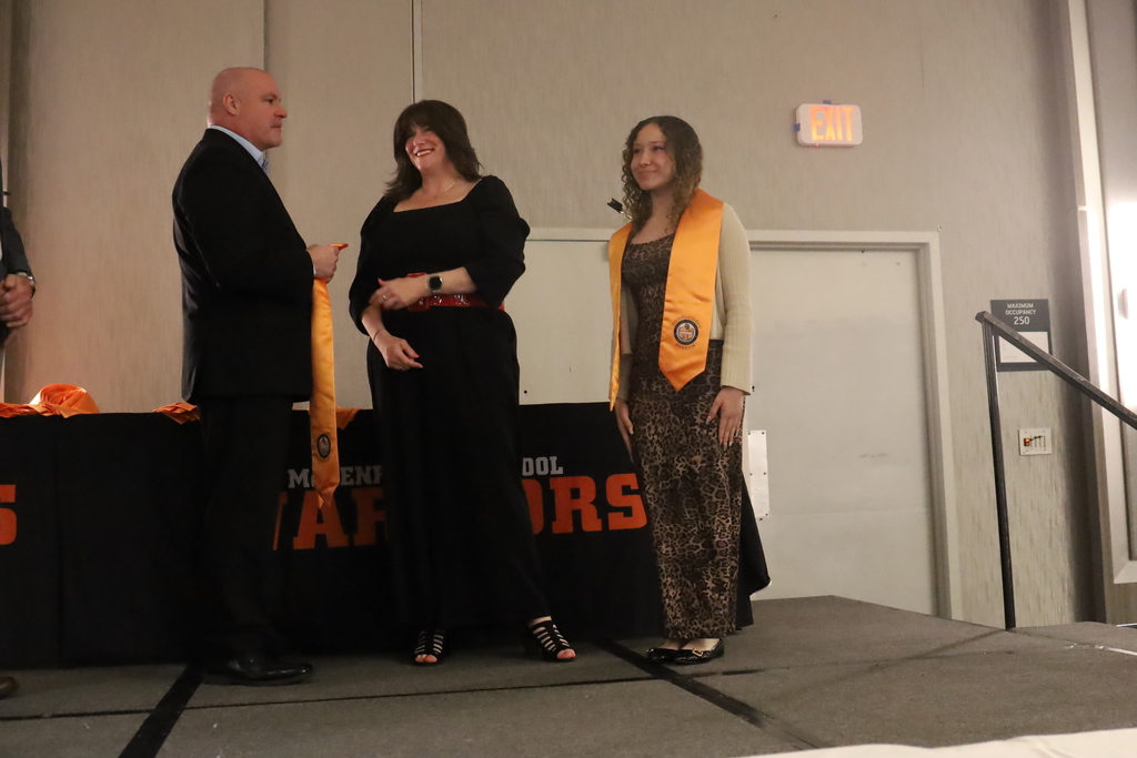 Student on stage with stole