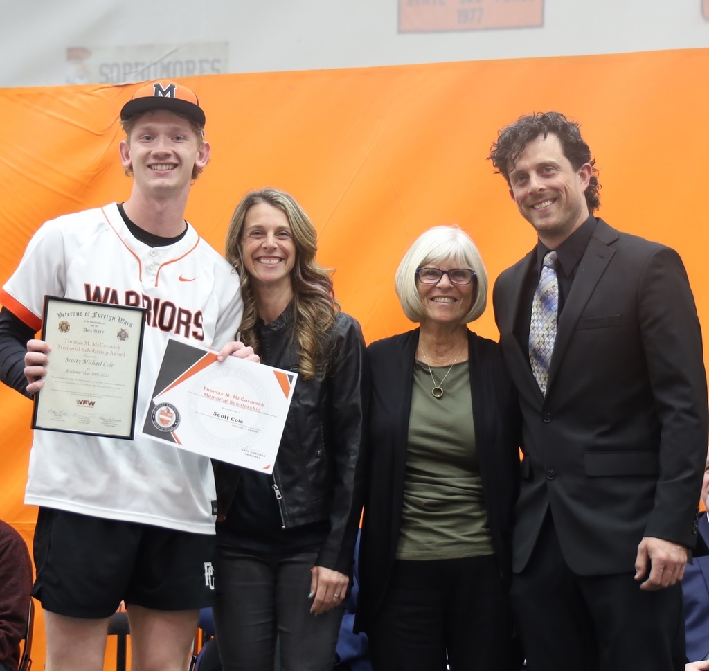 Three representatives with a student for the Thomas McCormack Memorial Scholarship