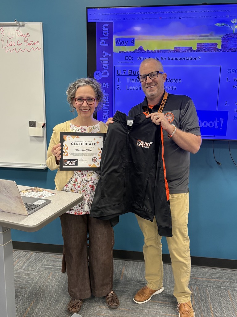 Vanessa Kirk with Greg Eiserman and her certificate